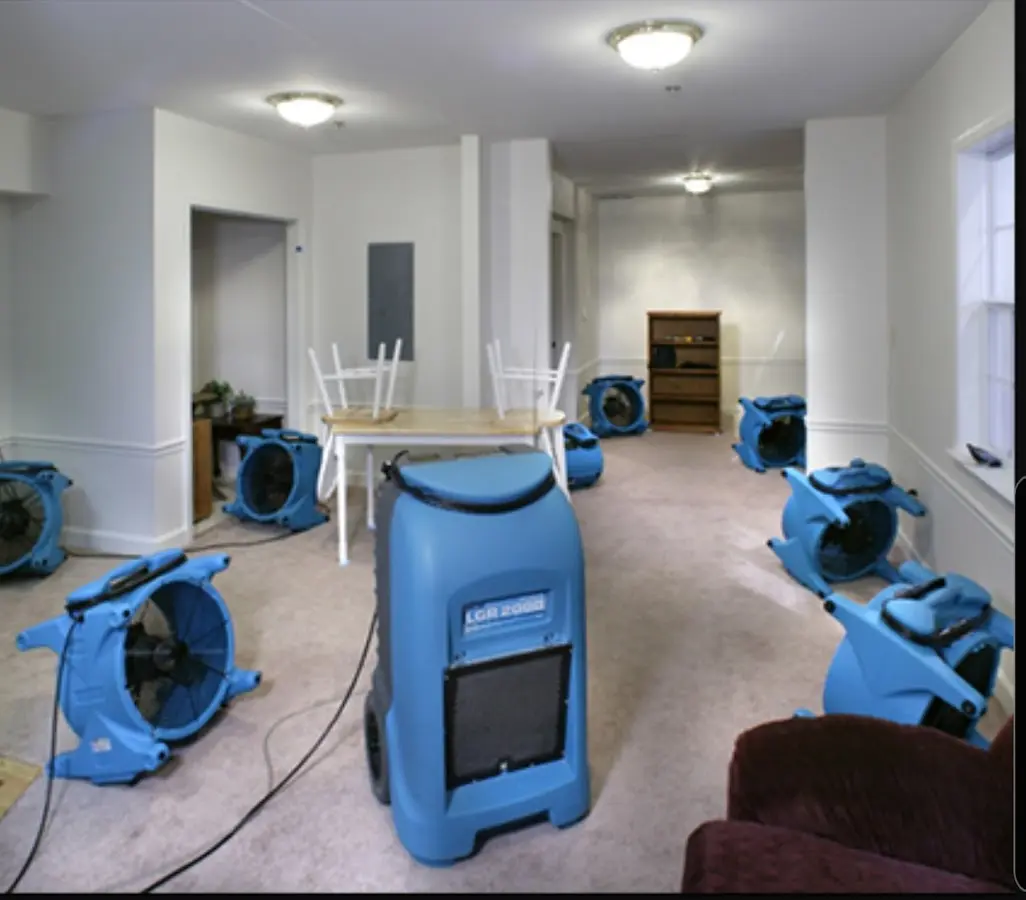 Air movers and dehumidifier setup for Water Damage Restoration in Moreau